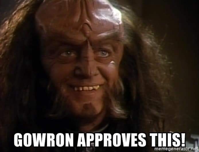 This meme is a humorous image of a character from the Star Trek franchise, specifically a Klingon warrior named Gowron. The image shows Gowron's face with a raised eyebrow and a hint of a smile, accompanied by the text "Gowron: I am Gowron. I will not be ignored. I will not be defeated. I will not be... " followed by the text "Gowron: I am Gowron. I will not be ignored. I will not be defeated. I will not be... (pauses) GOWRON APPROVES THIS!"
